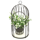 Cage d'oiseaux avec décoration de fleurs