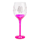 Compleanno trasparente in bicchiere di vino