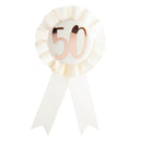 Insigne d'anniversaire en or rose sur rosette blanche